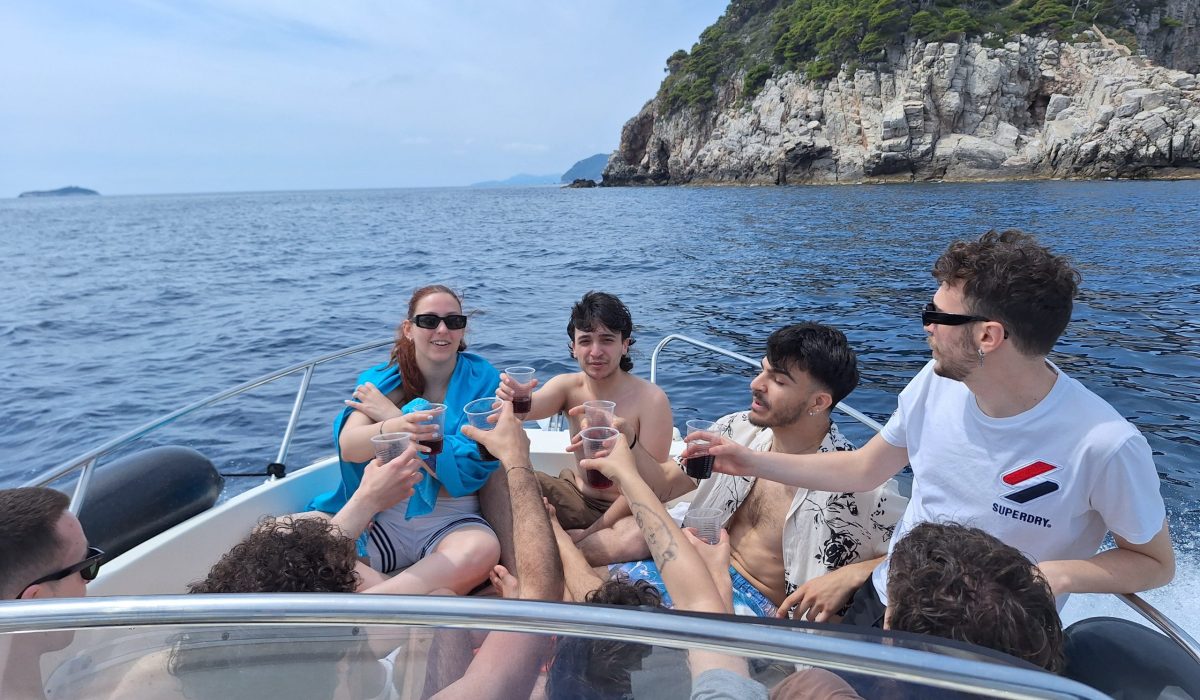 People enjoying on a speedboat